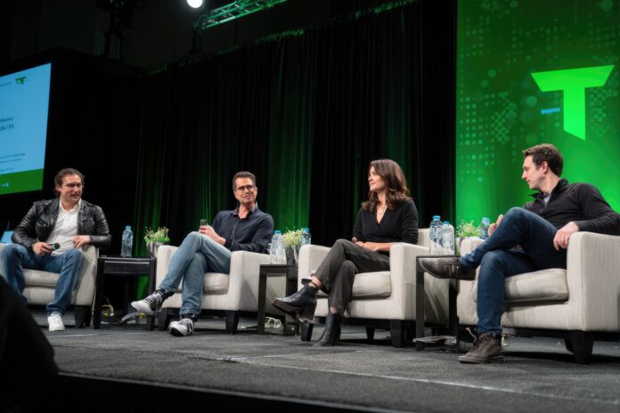 Panelists discussing AI breakthroughs on stage at TechCrunch Sessions
