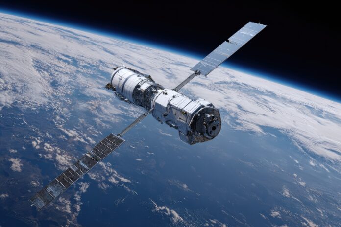 Artistic rendering of Space Forge’s ForgeStar satellite orbiting the Earth in low orbit.