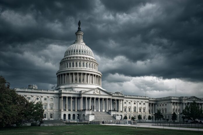 US Capitol under stormy sky symbolizing uncertainty in tech policy