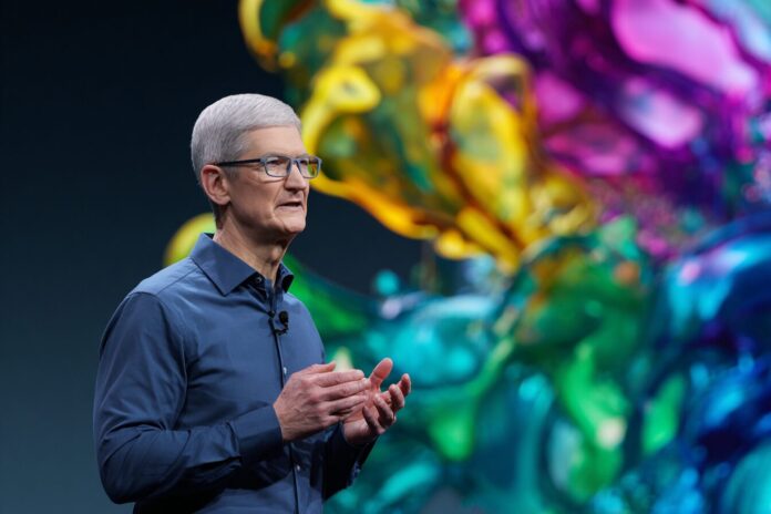 Apple CEO presents Liquid Glass UI at WWDC 2025 keynote with vibrant interface animation on display