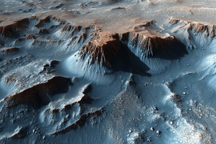 Color view of Martian surface with layered mounds rich in clay minerals.