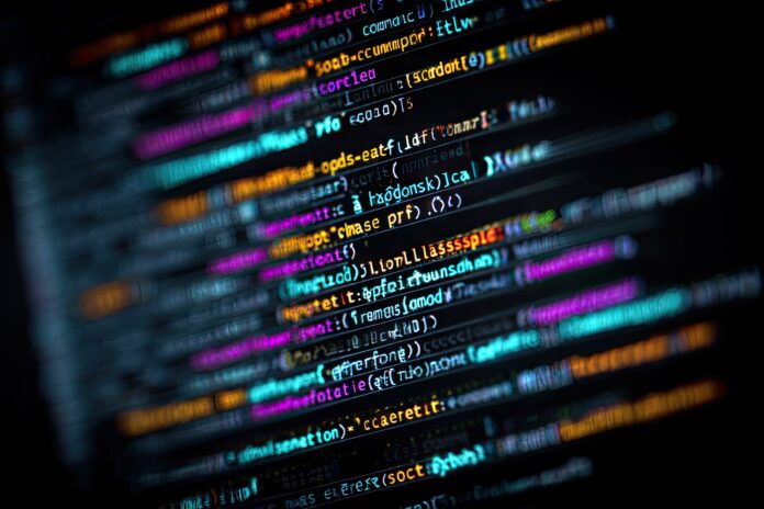 Code editor showing obfuscated malicious code within a JavaScript file.