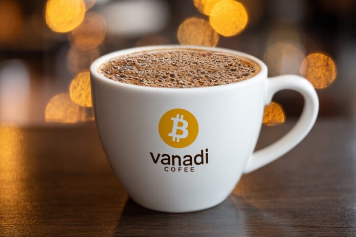 Vanadi Coffee logo on a cup with Bitcoin symbols in the background