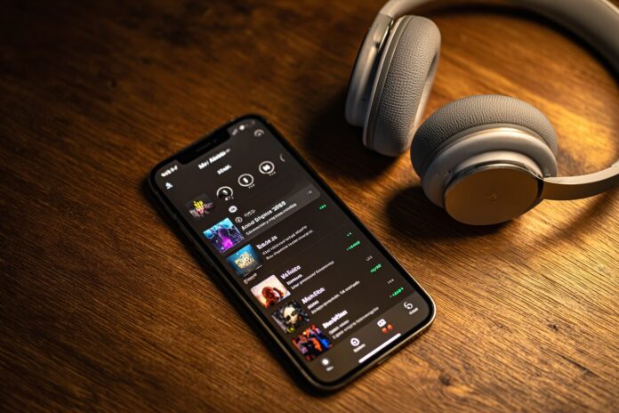 Apple Music AutoMix feature displayed on an iPhone running iOS 26
