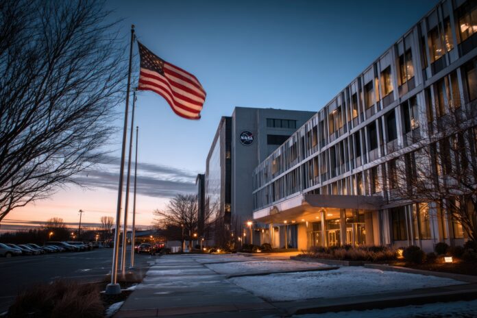 NASA headquarters at dusk, American flag flying.