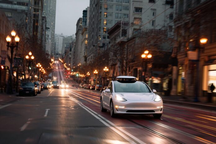 Tesla robotaxi driving autonomously in downtown San Francisco