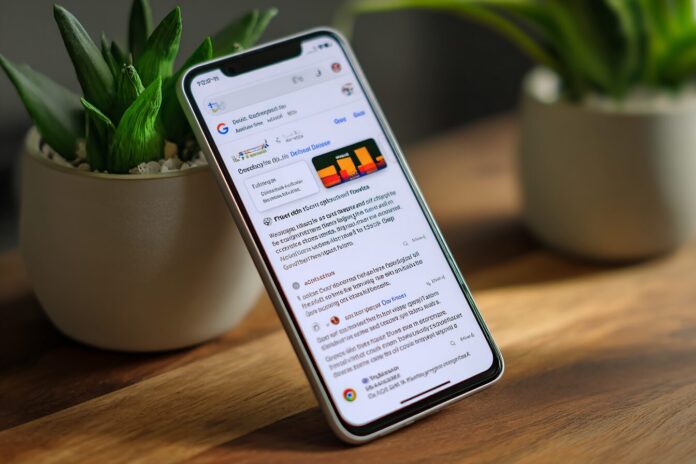 A smartphone displaying Google's Discover feed with a highlighted AI-generated summary card.