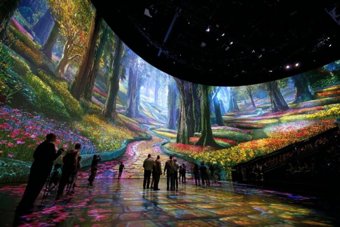 View inside the Las Vegas Sphere showing vibrant, AI-enhanced scenes from ‘The Wizard of Oz’ wrapping around immersive 360-degree screens.