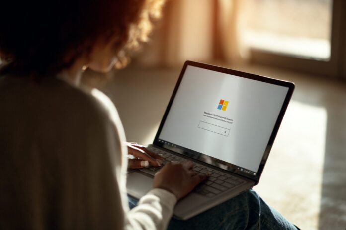 A person taking the Microsoft Real or Not Quiz on a laptop.