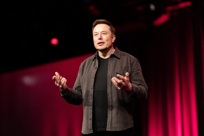 Elon Musk presenting Grok 4 at the launch event on X platform, speaking passionately on stage.