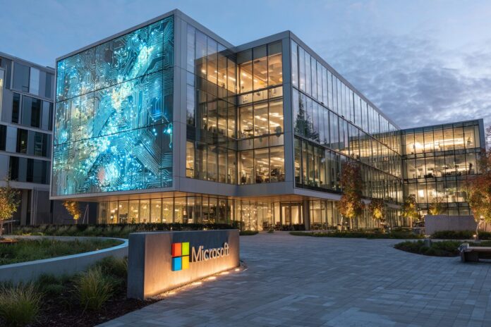 Microsoft headquarters with futuristic AI motifs in the background, representing corporate partnership in artificial intelligence.
