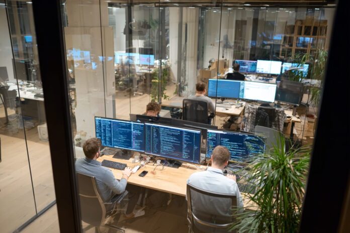 A modern fintech office where professionals are collaborating on stablecoin solutions