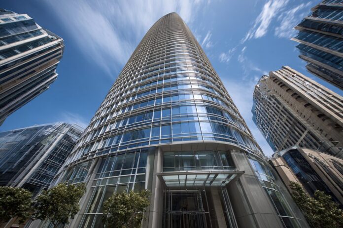 Exterior of Salesforce Tower with the company logo visible.