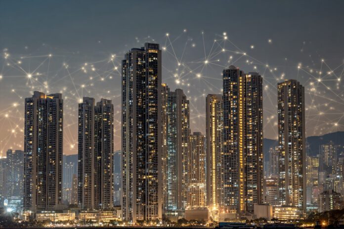 High-rise luxury real estate skyline at dusk representing digital tokenization.