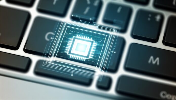 Close-up of MacBook keyboard and Apple Silicon chip icon overlay