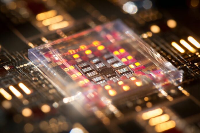 Close-up of a silicon photonic chip for high-speed data switching.