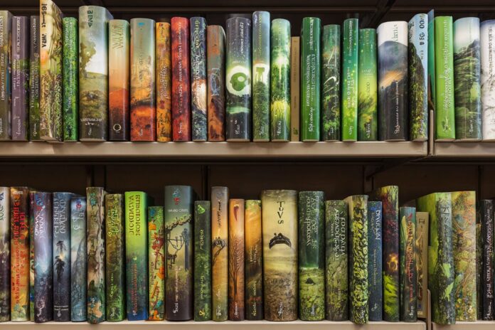 A shelf of climate fiction novels with eco-themed covers