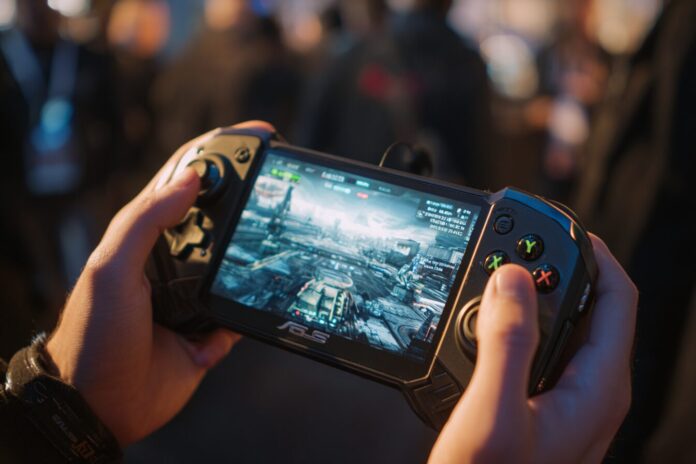 Asus ROG Xbox Ally X handheld being held by a gamer at a conference