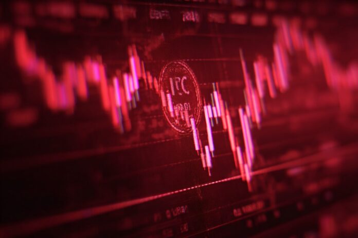 Internet Computer Protocol (ICP) token falling on digital price chart with bearish red candlesticks.
