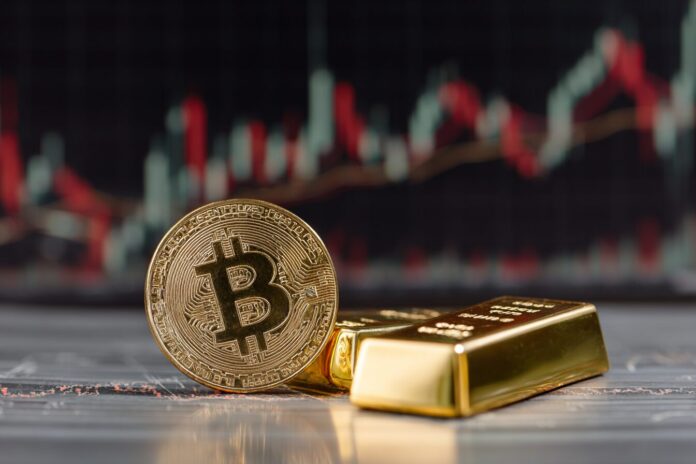 Golden Bitcoin and gold bar against a financial chart background