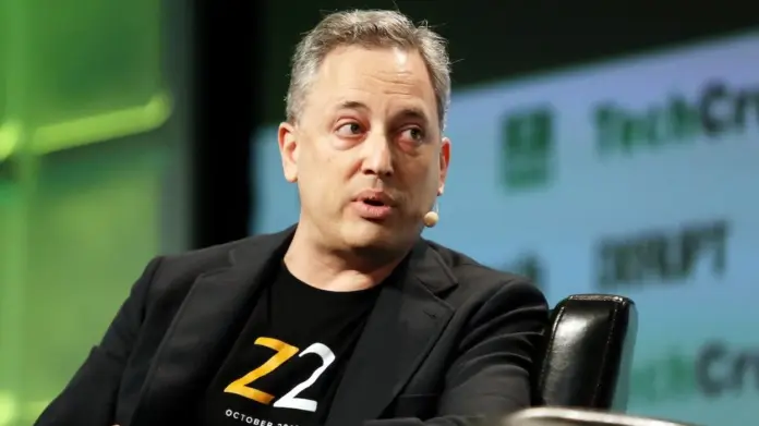 David Sacks speaking at a tech policy event, gesturing as he addresses an audience about future innovations.