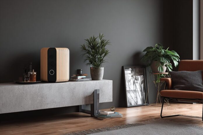 Modern compact subwoofer stylishly integrated into a living room audio setup