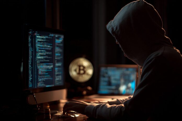 A hacker in a dark room manipulating browser extensions to steal cryptocurrency
