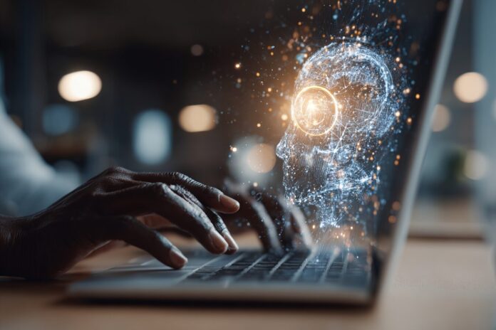 Professional at a laptop collaborating with an AI assistant interface on screen, symbolizing human-AI augmentation at work.