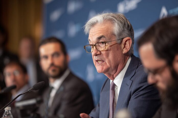 Federal Reserve Chair Jerome Powell speaking at an economic event.