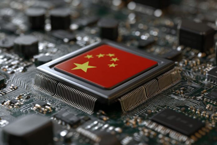 Close-up of AI processor chip on a circuit board with Chinese flag reflected in background to indicate domestic tech development.