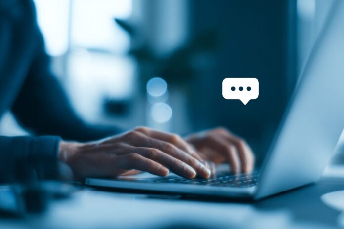 Federal employee using a laptop with ChatGPT logo, symbolizing AI-powered government work