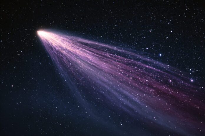 A vibrant interstellar comet with an enormous coma and streaming tail, zooming past stars.
