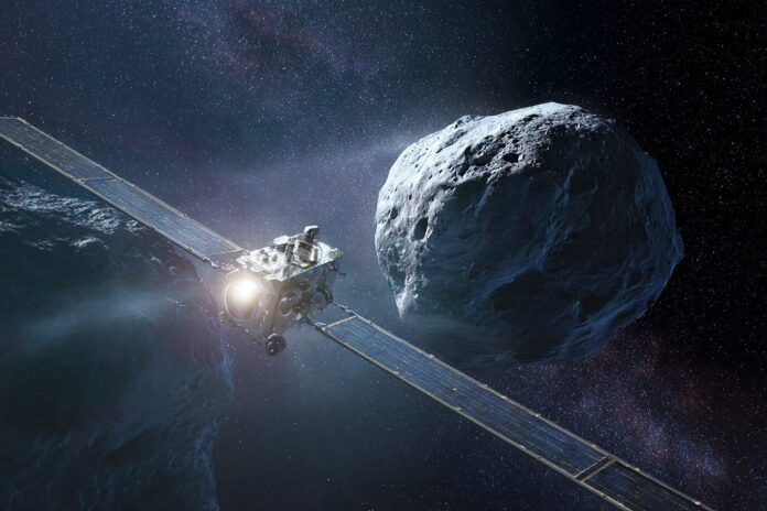 Hayabusa2 spacecraft approaching asteroid 1998 KY26 against the deep space backdrop.