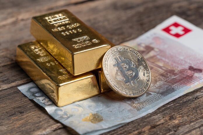 A stack of physical gold bars, a Swiss franc banknote, and a gold-colored Bitcoin coin arranged together.