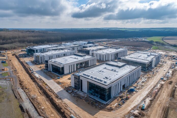 Aerial view of modern data center construction for AI infrastructure in the UK