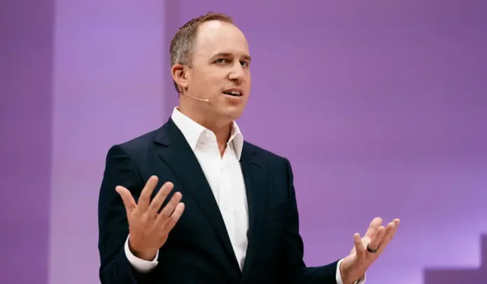 Bret Taylor speaking at a tech conference about the future of AI agents in business