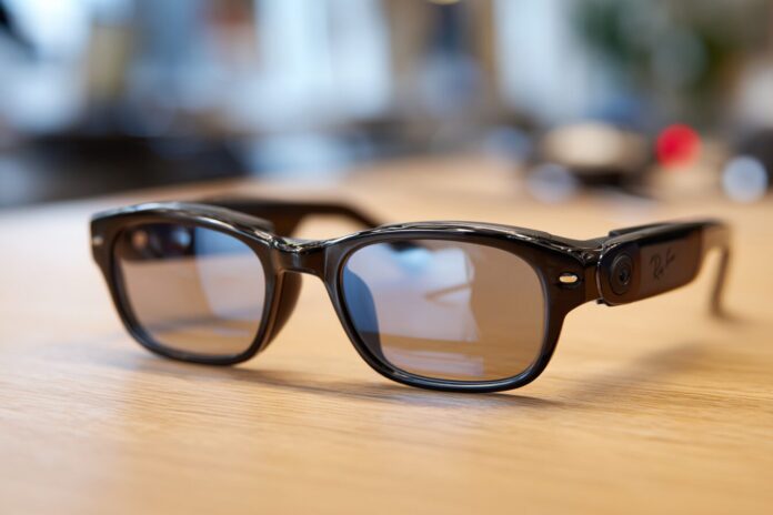 Ray-Ban Meta Gen 2 smart glasses folded on a desk.