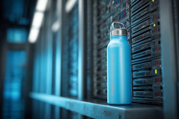 Blue water bottle set beside a data center server rack.