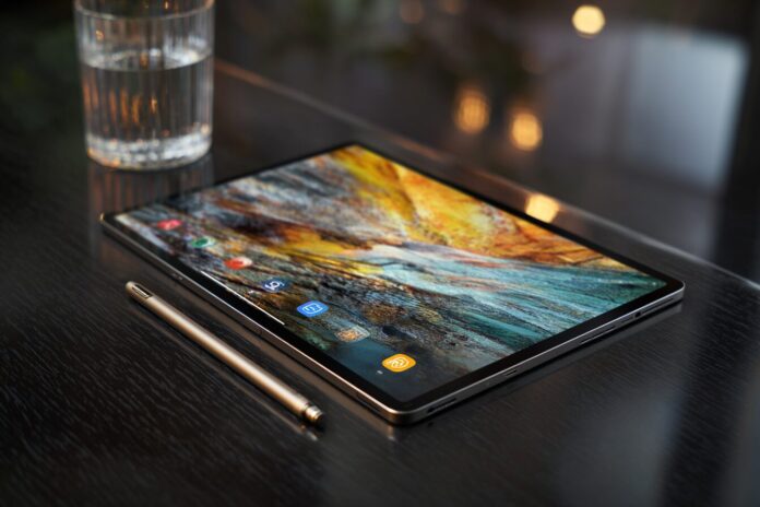 Samsung Galaxy Tab S9 Ultra in front of iPad Pro with styluses