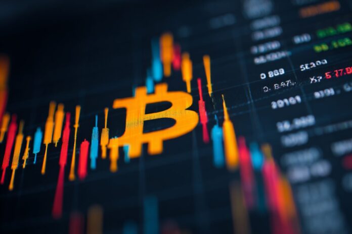Bitcoin logo on a digital price chart showing fluctuating values, symbolizing market volatility.